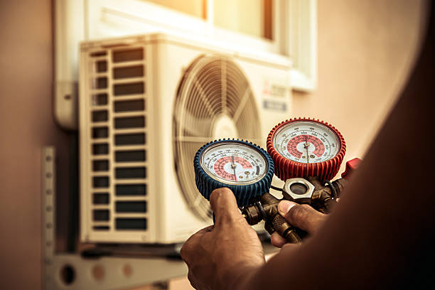Professional Hvac technician working in Sagamore, MA